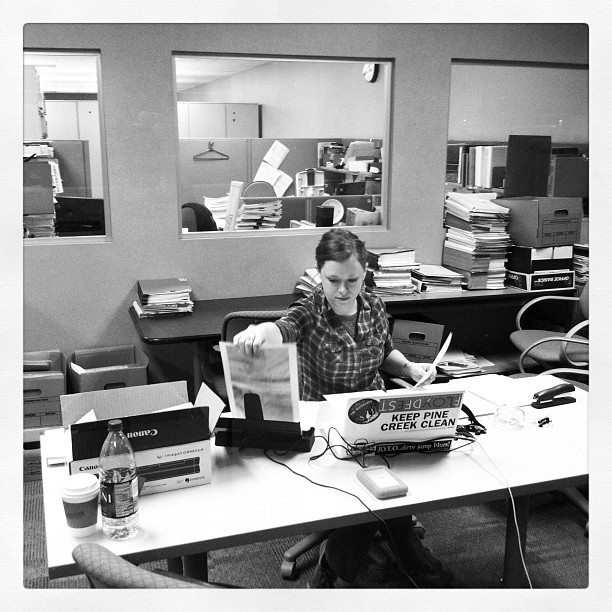 Public Herald Executive Director, Melissa Troutman, scans files at DEP's office in Williamsport, PA. © Joshua B. Pribanic