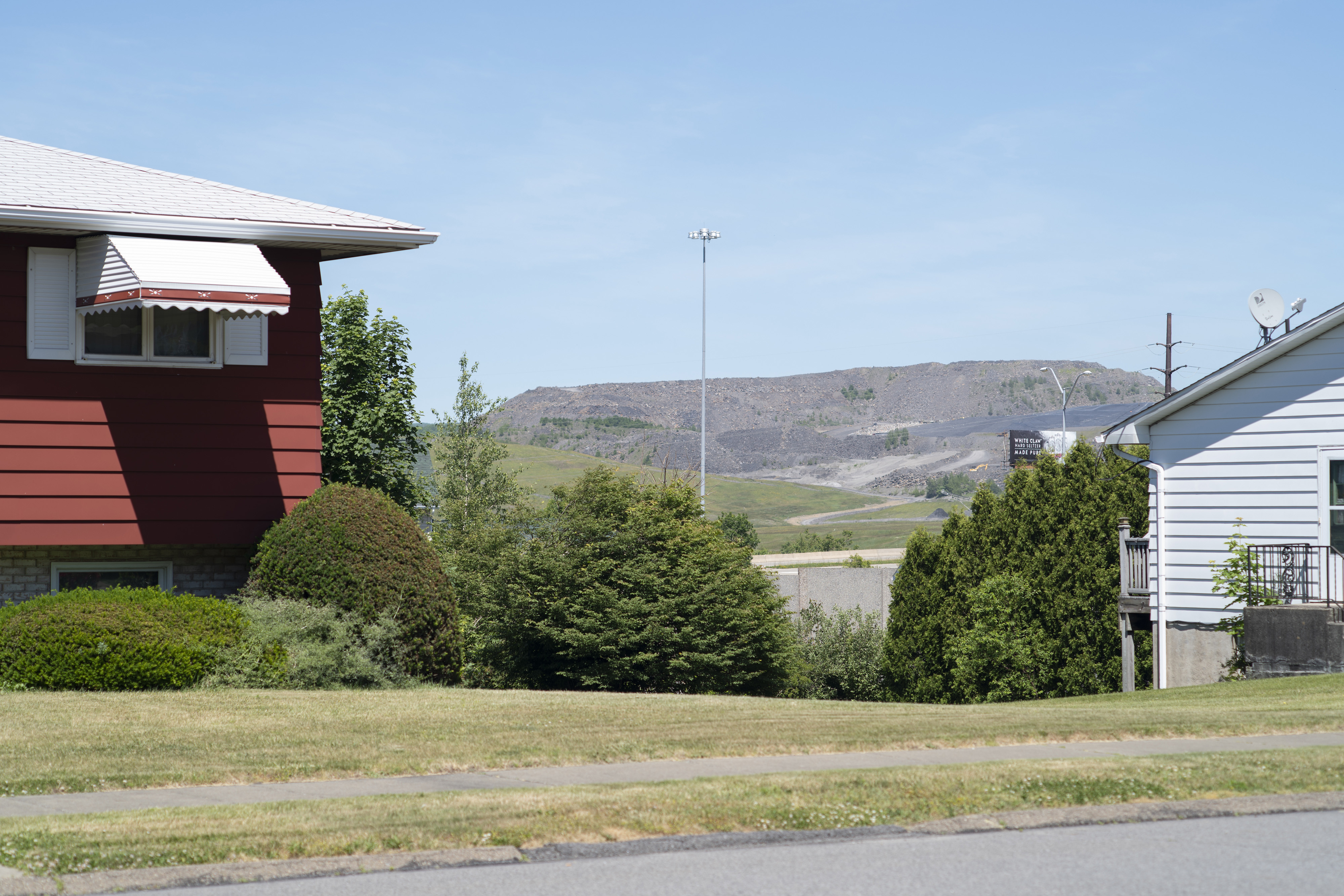 USA, Pennsylvania, June 17, 2020. A view of the Keystone Sanitary Landfill (in the background) from a residential street